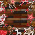 Christmas background, small rustic decorations on parquet texture Royalty Free Stock Photo