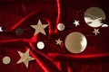 Abstract Christmas background made of red velvet fabric with stars. Royalty Free Stock Photo