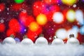 Abstract Christmas background,New Year and Christmas background. Blue and white Christmas toys lie on the snow, with a bright Royalty Free Stock Photo