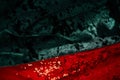 Abstract Christmas background. Red and green velvet fabric with red sparkles. Royalty Free Stock Photo