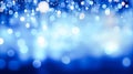 Abstract Christmas blue bokeh background. defocused lights Xmas modern design. For Christmas cards, posters, art texture, Royalty Free Stock Photo