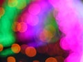 Abstract Christmas Bokeh rainbow blurred background, lightbulb on Christmas tunnel lights for celebrate season with red, green. Royalty Free Stock Photo