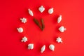 Abstract Christmas clock with white glass toys on red paper background. Christmas, new year concept Royalty Free Stock Photo