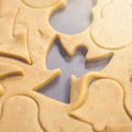 Abstract Christmas food background with cookies molds and flour. Baking Christmas cookies - table, cookie cutters and cookies. Royalty Free Stock Photo