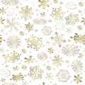 Abstract Christmas seamless pattern with golden snowflakes Royalty Free Stock Photo