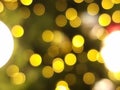 abstract christmas tree bokeh blur light circle red orange and yellow glowing flare pattern black background Royalty Free Stock Photo