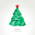 Abstract christmas tree made of green triangles.