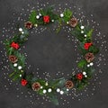 Abstract Christmas Wreath with Baubles and Winter Flora Royalty Free Stock Photo