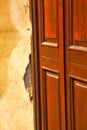 abstract church door in italy lombardy red