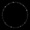 An abstract circle of white sparkling stars