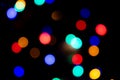 Abstract circular bokeh background of colorful Christmaslights in the dark Royalty Free Stock Photo