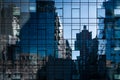 Abstract cityscape reflections in windows on a modern skyscraper