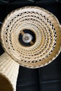 Abstract close up from bottom of weave lamp Asian style hanging on ceiling