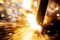 Abstract close-up image of blurred sparks and smoke from arc welding with bokeh effect Royalty Free Stock Photo