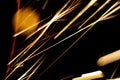 Abstract close-up image of blurred sparks and smoke from arc welding with bokeh effect Royalty Free Stock Photo