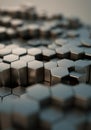 Abstract close-up of metallic hexagonal shapes creating a textured surface