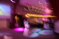 Abstract close up motion blur colourful image of happy dancing people in a disco night club Royalty Free Stock Photo