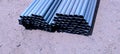 Abstract close up of a stack of steel pipes