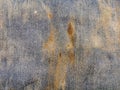 Abstract close up view faded blue jeans denim background and texture with stains.