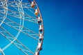 Closeup ferris wheel on blue sky art copyspace