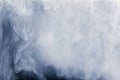 Abstract cloud pattern of white smoke on a black background. Royalty Free Stock Photo