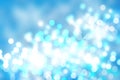 Abstract cloudy blue sky with colorful shining blur bokeh lights Royalty Free Stock Photo