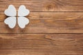 Abstract clover on wood background.