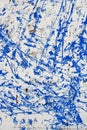 Abstract colored with blue paint old white textured wall