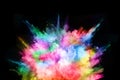 Abstract colored dust explosion on a black background. Royalty Free Stock Photo