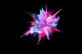Abstract colored dust explosion on a black background. Royalty Free Stock Photo