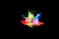 Abstract colored dust explosion on a black background. Royalty Free Stock Photo