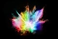 Abstract colored dust explosion on a black background. Royalty Free Stock Photo