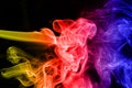 Abstract colored smoke isolated on a black. Royalty Free Stock Photo