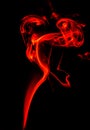 Abstract colored smoke isolated in black background Royalty Free Stock Photo