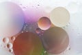 Abstract colorful backdrop with oil drops on water surface. Abstract background Royalty Free Stock Photo