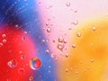 abstract colorful backdrop with oil drops on water surface. possible themes for the application - cosmetic advertising, space, fan Royalty Free Stock Photo