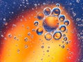 abstract colorful backdrop with oil drops on water surface. possible themes for the application - cosmetic advertising, space, fan Royalty Free Stock Photo