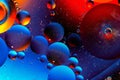 Abstract colorful background of oil circles. Oil in the water surface circles, water foam and oil bubbles. Royalty Free Stock Photo