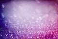 Abstract colorful background with purple and blue glittering light bubbles Royalty Free Stock Photo