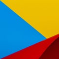 Abstract colorful background. Yellow red blue color paper in geometric shapes Royalty Free Stock Photo