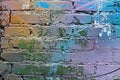 Abstract colorful blue, purple,orange, white and green painted brick wall Royalty Free Stock Photo