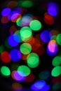 Abstract colorful bokeh background. Festive backdrop with colorful lights. Bright and festive atmosphere of coming Royalty Free Stock Photo