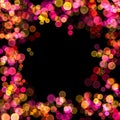 Abstract colorful bokeh sparkle frame on black background. Royalty Free Stock Photo