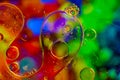 Abstract colorful bubbles. Mixing water and oil. Unrealistic colored bubbles, different color filters Royalty Free Stock Photo