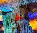 ABSTRACT AND COLORFUL DRAWINGS OF ILLUMINATED ROCKS IN THE CAVES OF HALONG BAY
