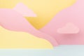 Abstract colorful empty stage mockup - paper landscape with mountains yellow, mint color with pink clouds in baby cartoon naive.