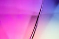 Abstract, colorful glass with a vibrant and dynamic composition captured in a blurry photo