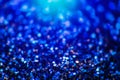 Abstract colorful glitter background with small blue hexagon, macro photo Royalty Free Stock Photo