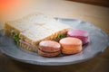 Abstract of colorful macaroon and sandwich ham cheese ready to eat Royalty Free Stock Photo