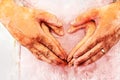 Pregnant woman with husband and hand love sign on watercolor illustration painting background. Royalty Free Stock Photo